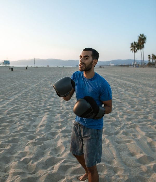 Person performing gentle morning cardio exercises in a bright room